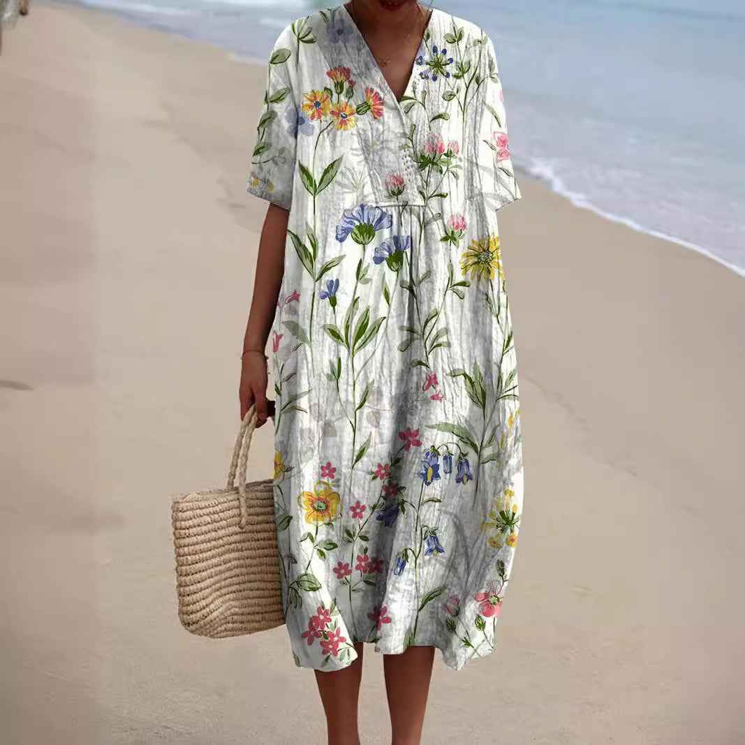 Sommerkjole blomstret feminin strandkjole