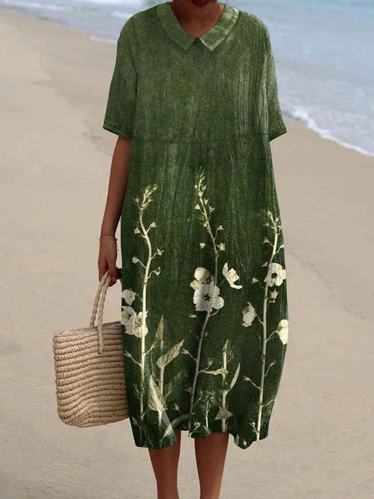 Sommerkjole blomstret feminin strandkjole