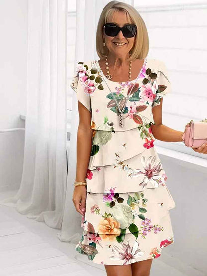 Sommerkjole blomstret feminin lang strandkjole
