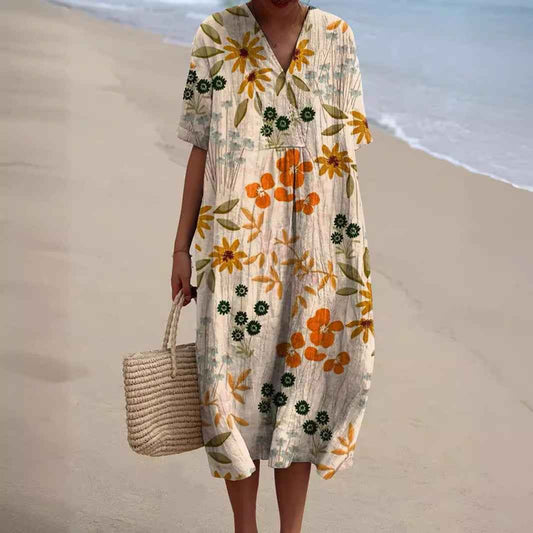 Sommerkjole blomstret feminin strandkjole