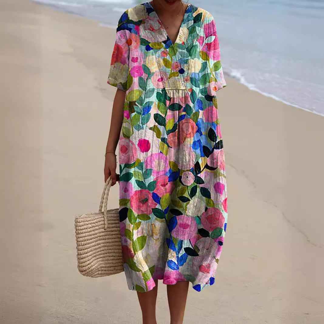 Sommerkjole blomstret feminin strandkjole